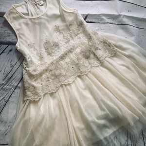 Girls beautiful Btween  cream colored dress with tule